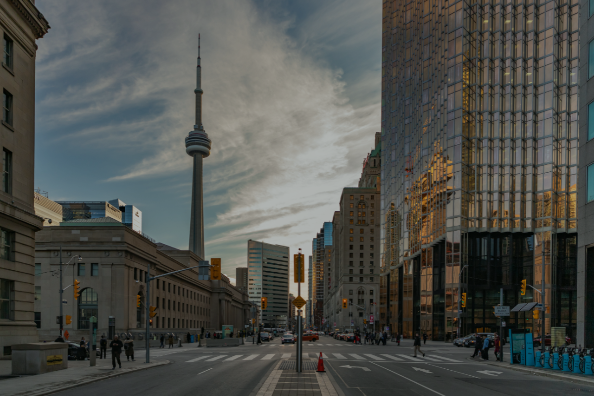 City of Toronto with CN Tower featuring mobile security patrol, armed guard services, and CCTV installation service for enhanced safety.